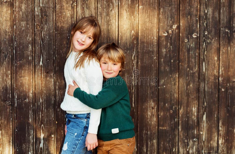 Warmth chapter 2. Mothers warmth Ch 3. Big sister and little brother. Japanese big and little brother. The boy Stood against a Wood Screen and Khan.