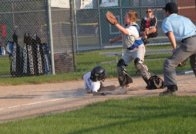 Little League Baseball Player Sliding Home. Stock Image Image of