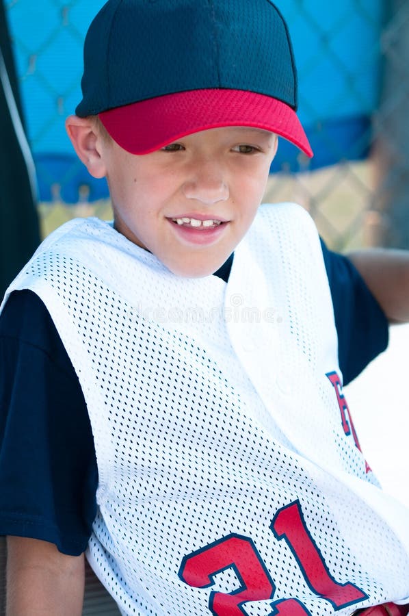 LIttle League Baseball Player in Dugout Stock Image Image of team