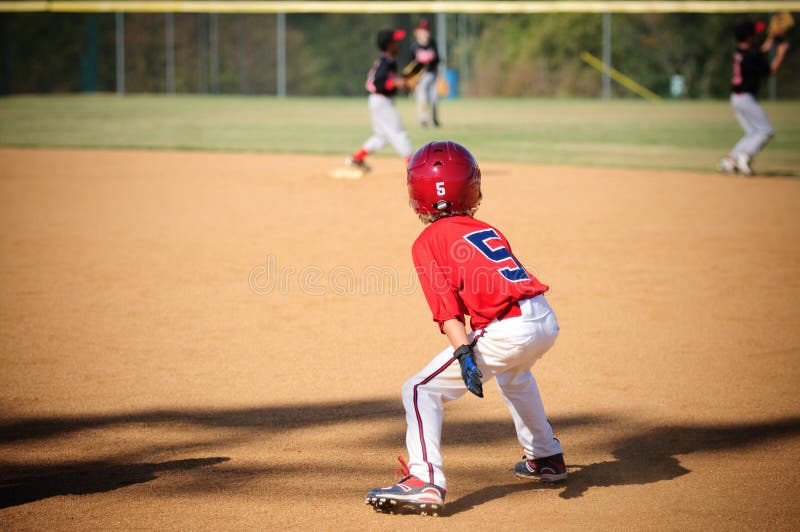 Little League Baseball Player Trying To Steal Stock Photo Image of