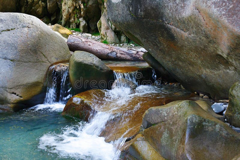 Little marvellous refreshing waterfalls among rocks stock photos Little marvellous refreshing waterfalls among rocks stock photos