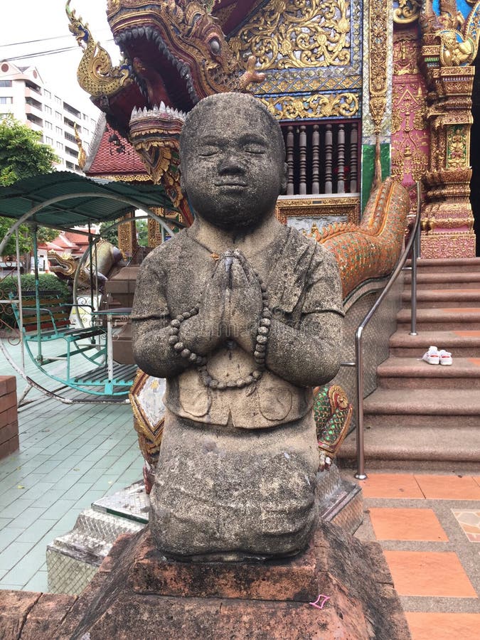 Little Monk Sculpture in Chiangmai Temple stock photo Little Monk Sculpture in Chiangmai Temple stock photo