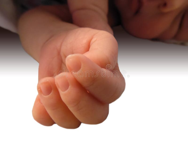 A little newborn baby girl sleeps sweetly and puts forward her cute pen royalty free stock images A little newborn baby girl sleeps sweetly and puts forward her cute pen royalty free stock images