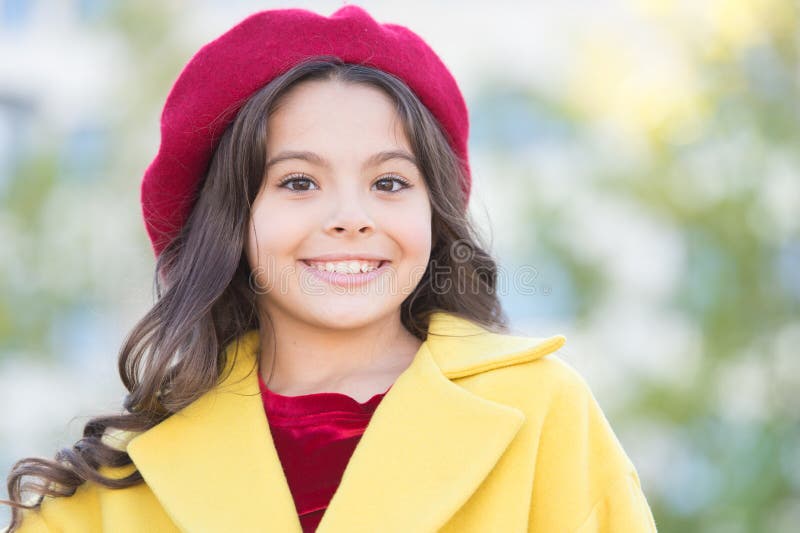 Little parisian. Fancy girl. Kid little cute girl smiling face posing hat defocused background. Fashionable hat royalty free stock images