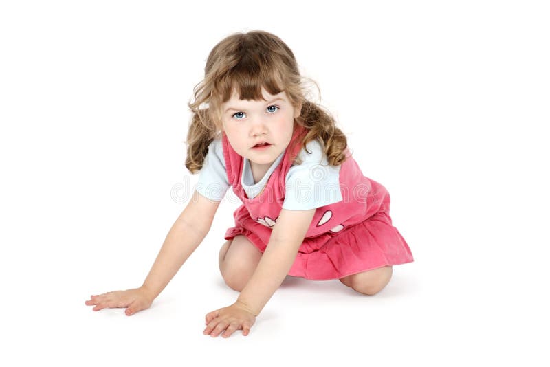 Little pretty girl sits on floor