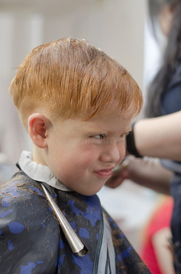 Red-haired Boy in the Barbershop Grimaces. Boy 4 Years Old in a Hairdresser  Stock Image - Image of male, caucasian: 224975631