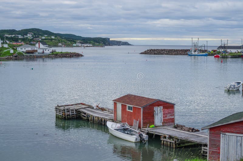 Little red shed & boat on a dock in Twillingate. royalty free stock photos Little red shed & boat on a dock in Twillingate. royalty free stock photos