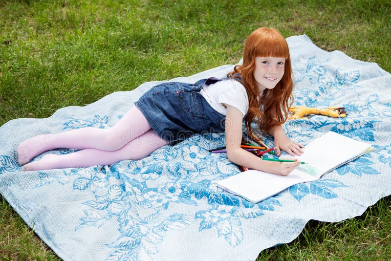 Little Redhead Girl Drawing Stock Image - Image of people, pencilling