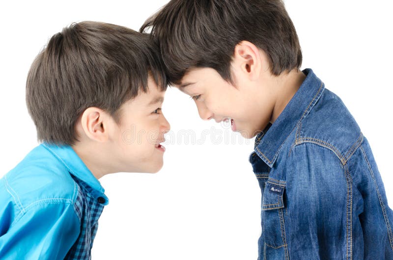 Little sibling boy fighting on white background