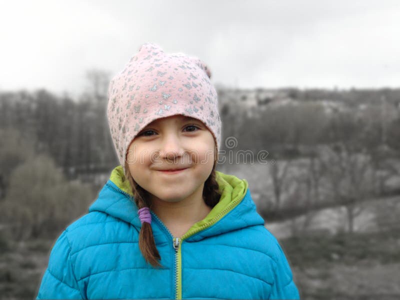 Little Smiling Girl on a Gray Landscape Stock Image - Image of people ...