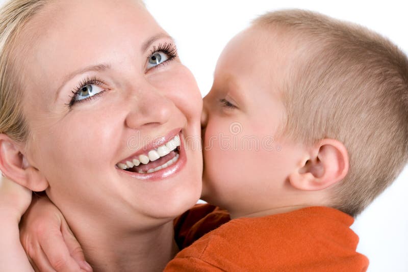 Little son kisses mum