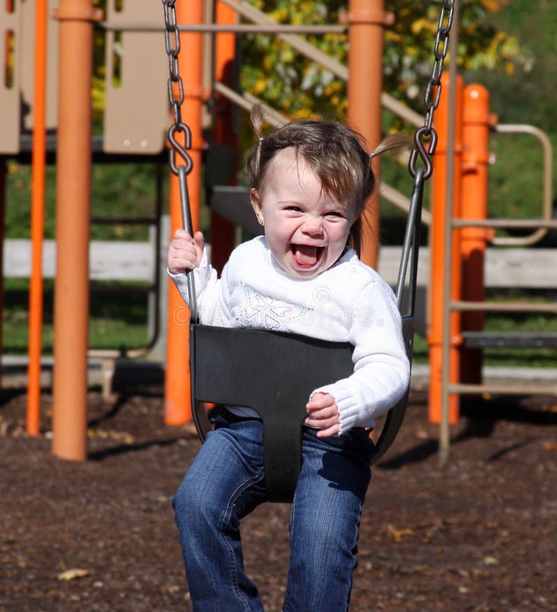 Little Toddler Girl on a Swing Stock Image Image of female, cute
