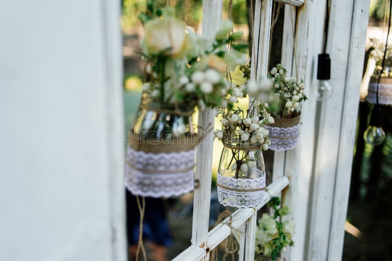 Little wedding floral decorations in rustic style stock photo Little wedding floral decorations in rustic style stock photo