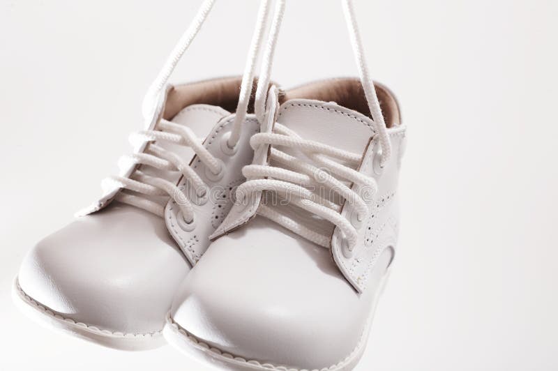 Little white shoes royalty free stock photography