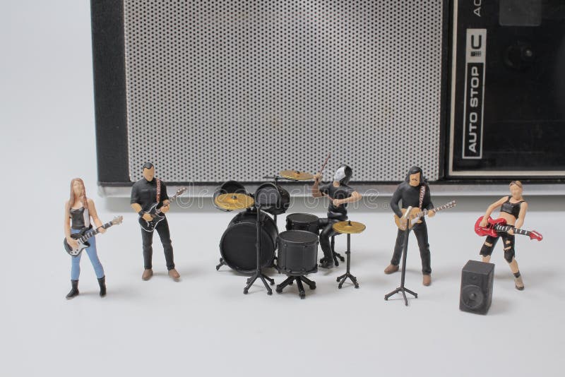 A Live Concert, Mini of Figure Rock Band in Action Stock Photo Image