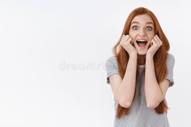 Lively amused thrilled happy young cute redhead girl popping blue eyes surprised screaming cheerfully excited see royalty free stock photo Lively amused thrilled happy young cute redhead girl popping blue eyes surprised screaming cheerfully excited see royalty free stock photo