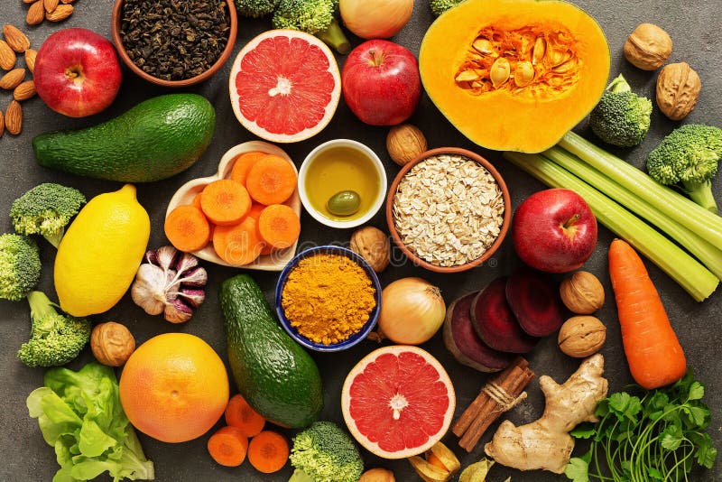 Liver detox diet food concept. Health foods high in antioxidants and fiber. Fruits,vegetables, nuts, olive oil, citrus , green tea. Turmeric, oats. Top view royalty free stock images Liver detox diet food concept. Health foods high in antioxidants and fiber. Fruits,vegetables, nuts, olive oil, citrus , green tea. Turmeric, oats. Top view royalty free stock images