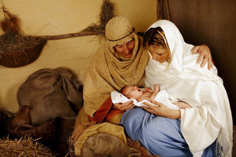 Rappresentazione della scena del presepe con persone reali.