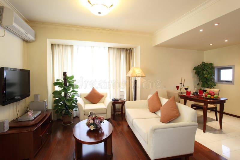 Elegantní zařízení poskytující ubytovací služby nebo byt obývací pokoj.