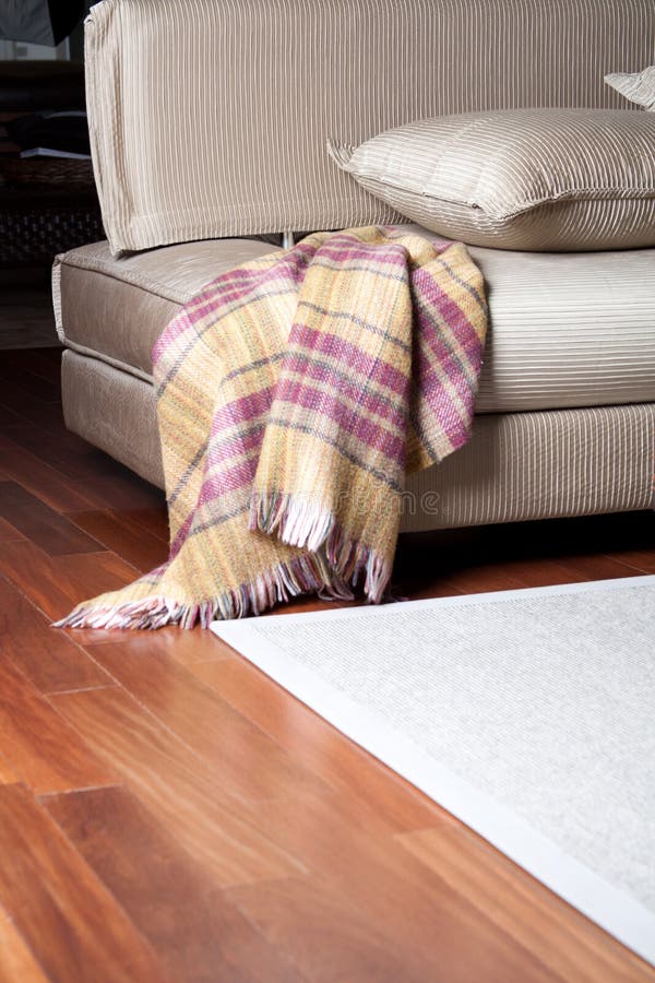 Throw draped over a chair stock image. Image of house 9751533