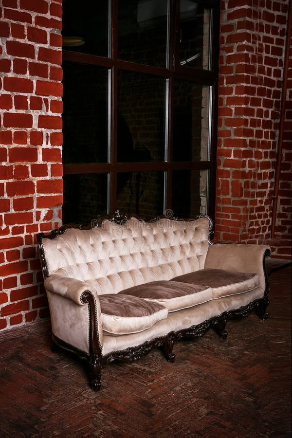 Living Room With Beige Sofa On The Red Brick Wall Stock Image Image