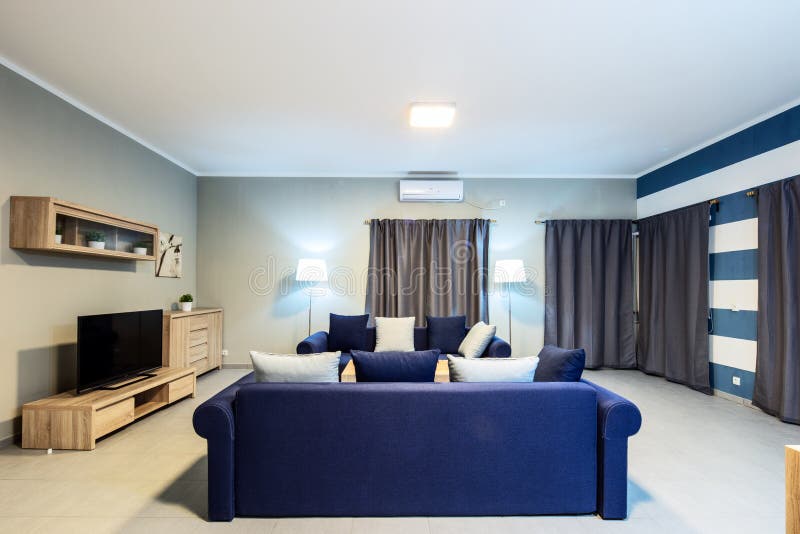 Living Room with Blue Sofas and Coffee Table Stock Photo Image of