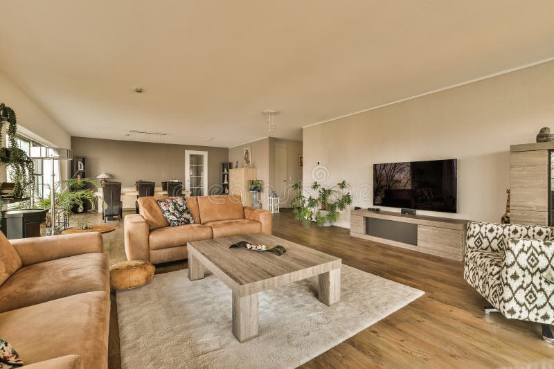 A Living Room with Couches and a Coffee Table Stock Image Image of
