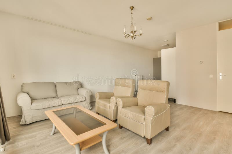 A Living Room with Couches and a Coffee Table Stock Image Image of