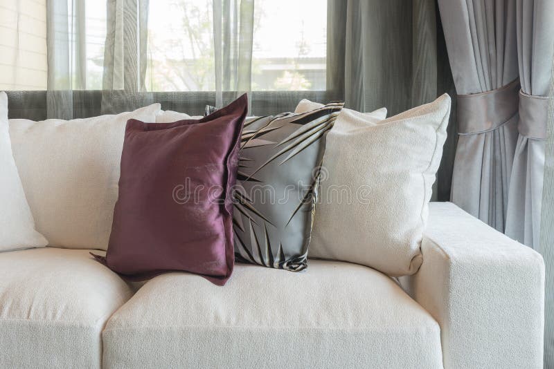 Living Room Design with White Sofa and Set of Pillows Stock Photo