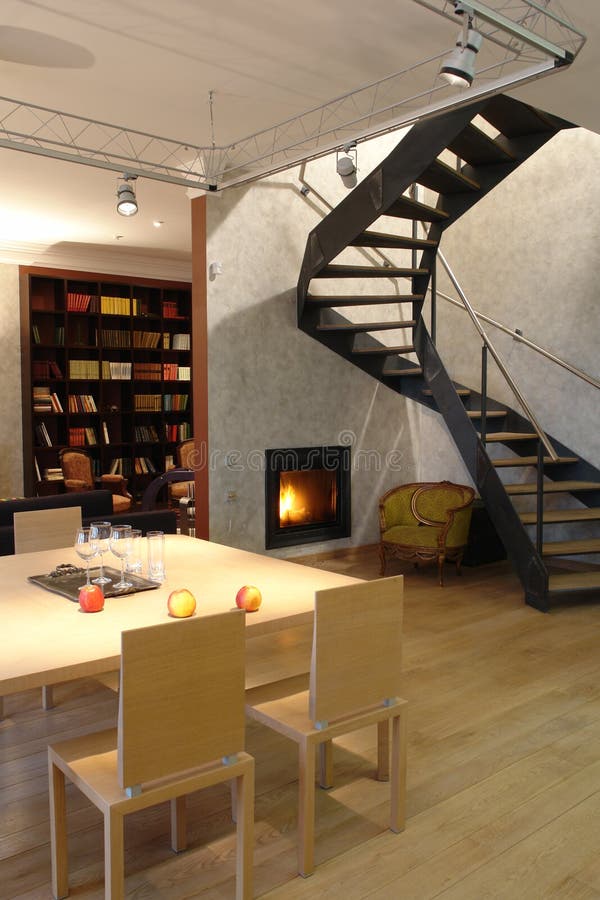 living room with fireplace and stair