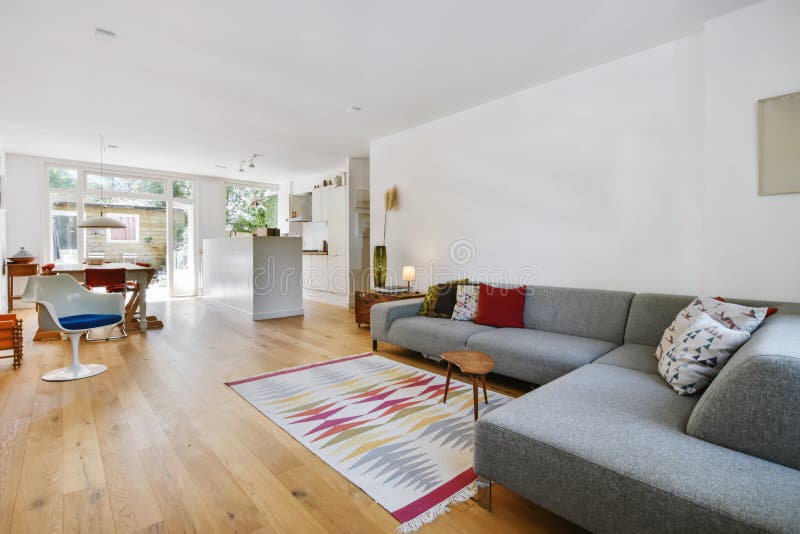 Living Room with Grey Sofa and Decorative Elements Stock Photo - Image