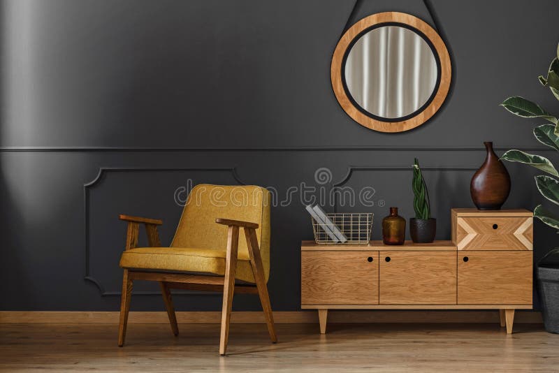 Mirror, cupboard and armchair