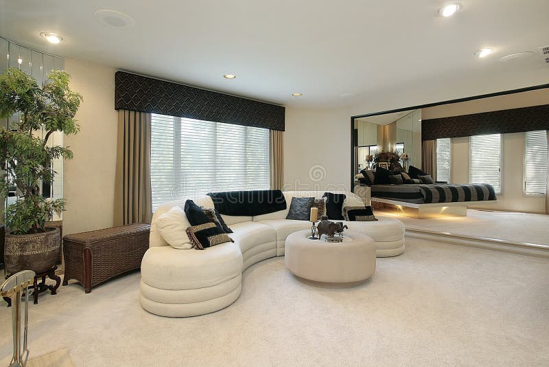 Living Room with Mirrored Walls Stock Photo Image of lighting