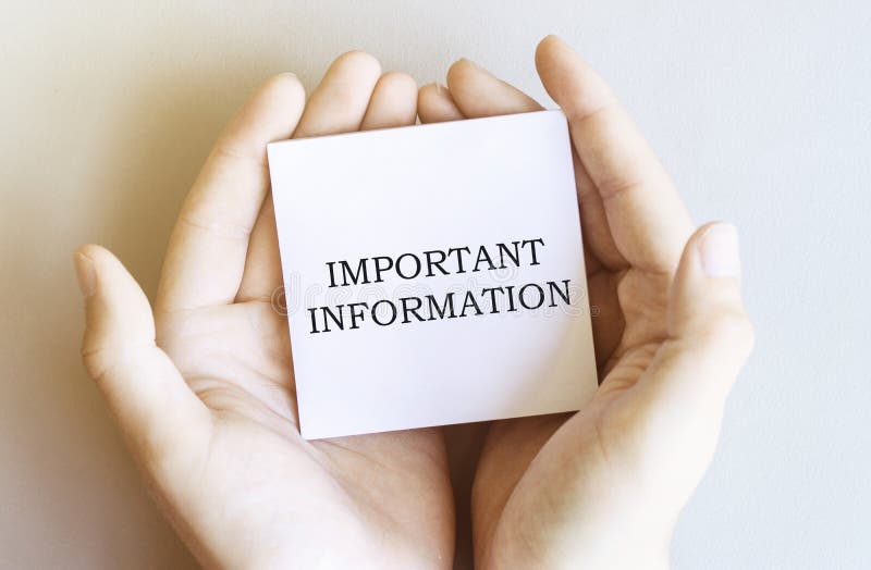 White paper with text Important Information in male hands on a white background. business concept. White paper with text Important Information in male hands on a white background. business concept