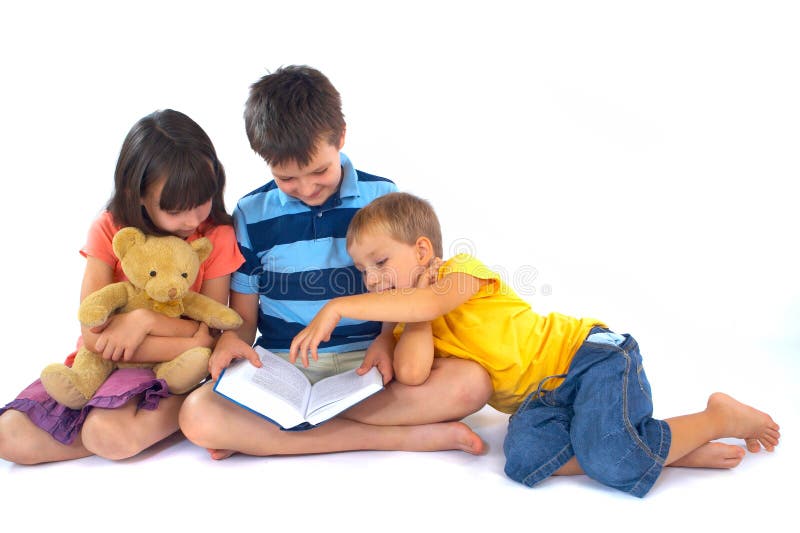 Livre de relevé de trois enfants image stock Livre de relevé de trois enfants image stock