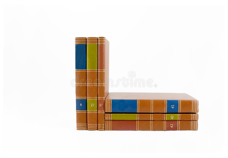 Six colorful books stacked and upright. Six colorful books stacked and upright.