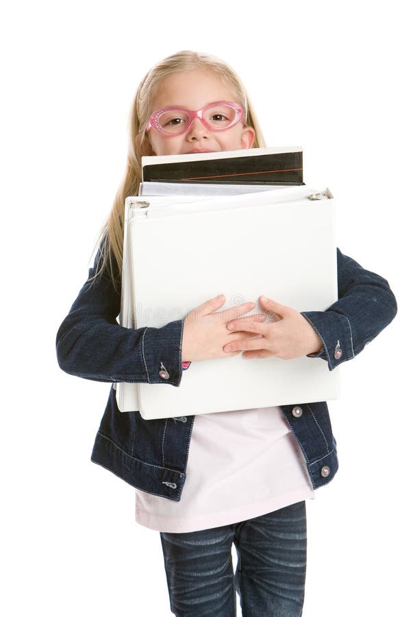 Livres mignons de fixation de petite fille d'isolement sur le blanc photo stock Livres mignons de fixation de petite fille d'isolement sur le blanc photo stock