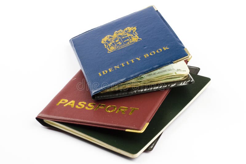 Livro e passaporte da identificação