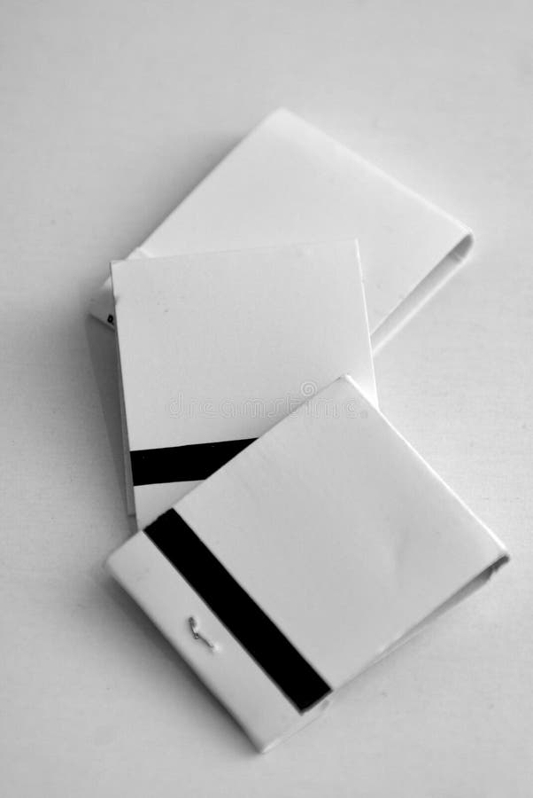 Three blank whie match books on white background, ready to ad your text. Three blank whie match books on white background, ready to ad your text