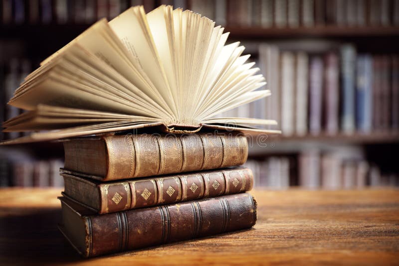Livros na biblioteca imagem de stock Livros na biblioteca imagem de stock