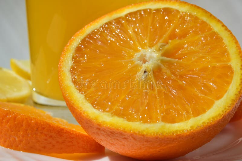 Ljusa saftiga orange skivor stänger sig upp fotografering för bildbyråer Ljusa saftiga orange skivor stänger sig upp fotografering för bildbyråer
