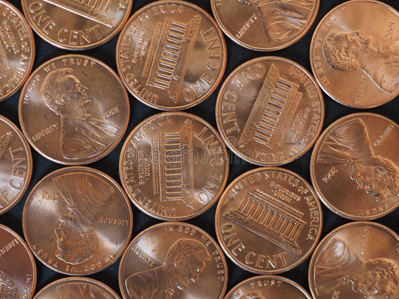 Lle monete di un dollaro del centesimo, Stati Uniti sopra il nero fotografia stock Lle monete di un dollaro del centesimo, Stati Uniti sopra il nero fotografia stock