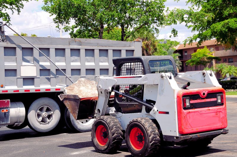 Loader loading truck in South Florida