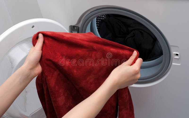 Loading washing machine stock photo