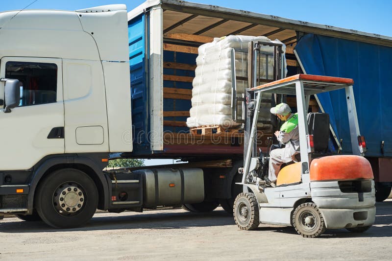 Loading Works. Forklift with Load and Lorry Truck Stock Image - Image