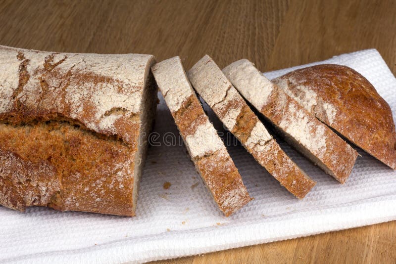 Loaf of Bread Cut into Slices on a Napkin Stock Image Image of
