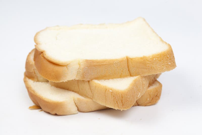 Loaf of bread on wooden plate