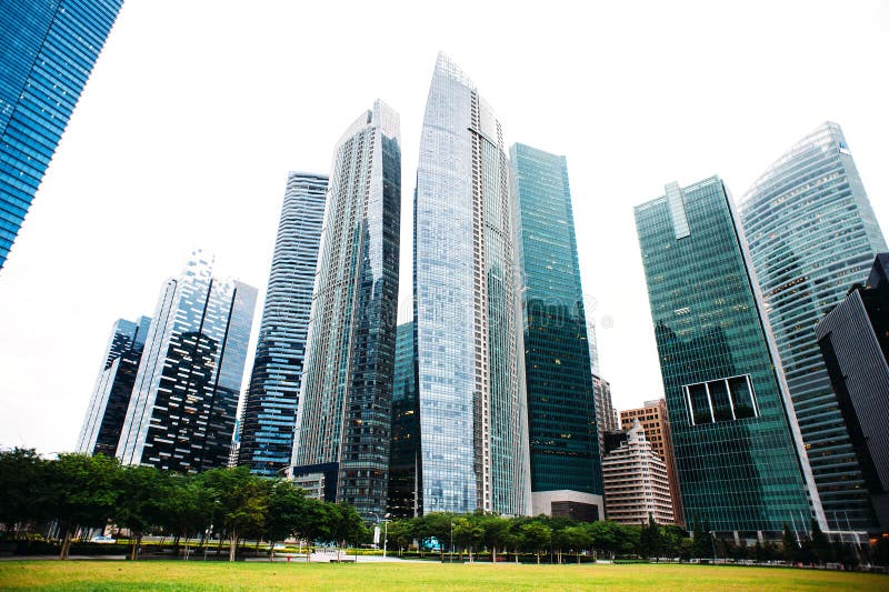 Skyscraper Business Office, Corporate Building In Singapore. Skyline of modern megalopolis. Skyscraper Business Office, Corporate Building In Singapore. Skyline of modern megalopolis.