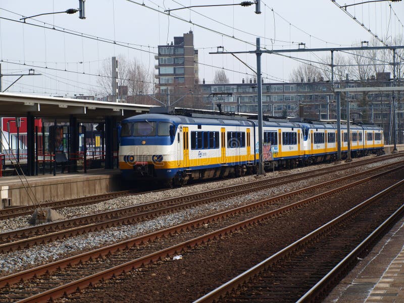 Local commuter train named sprinter at the railroad station of Gouda in the Netherlands. stock image