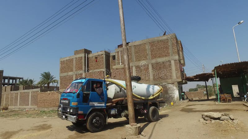 Local man driving water tank truck